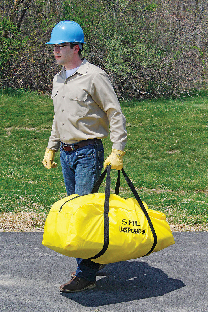 Guy carrying Universal Duffle Bag Spill Kit